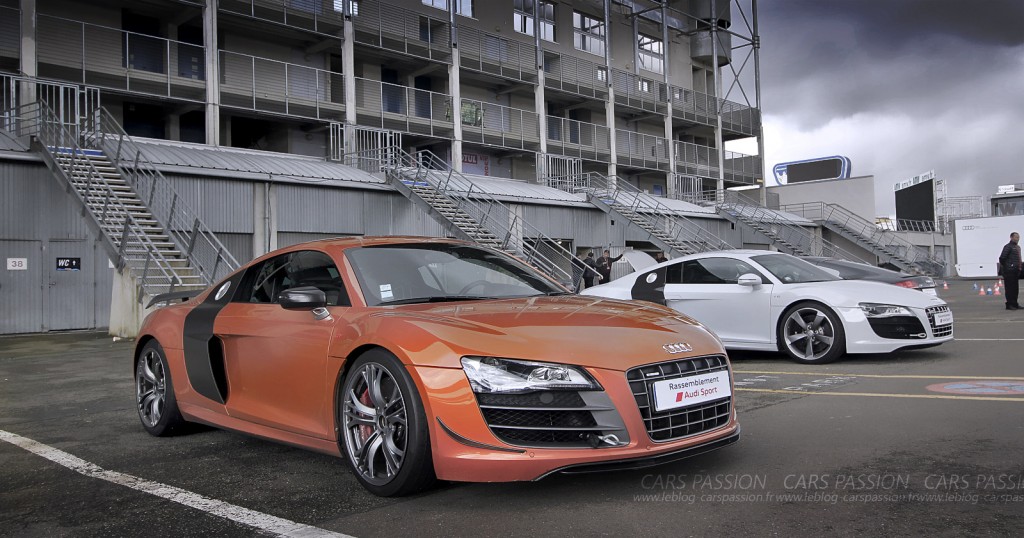 Audi R8 orange rassemblement Audi Sport le Mans Bugatti